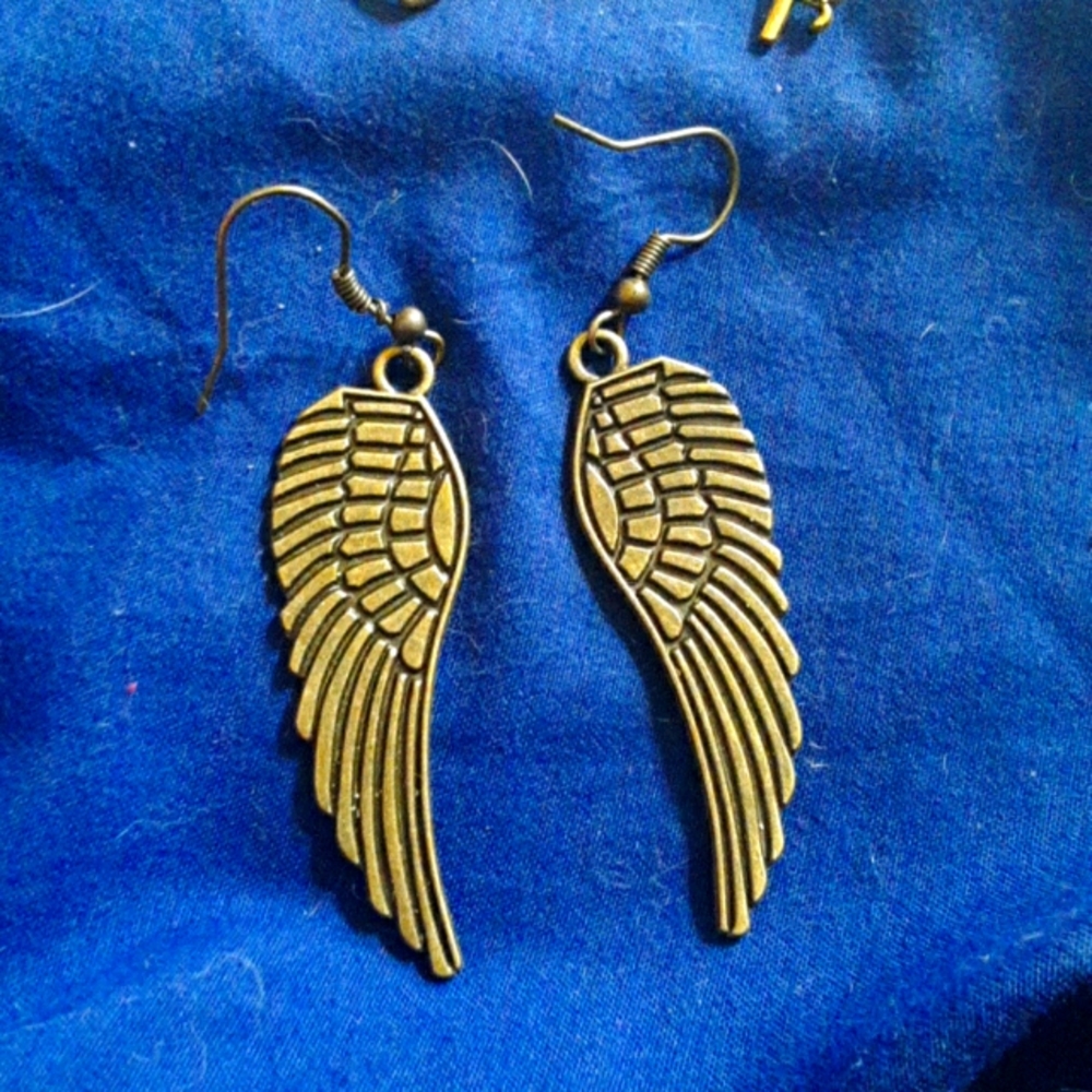 Large brass angel wing earrings